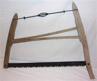 Vintage wooden buck saw.