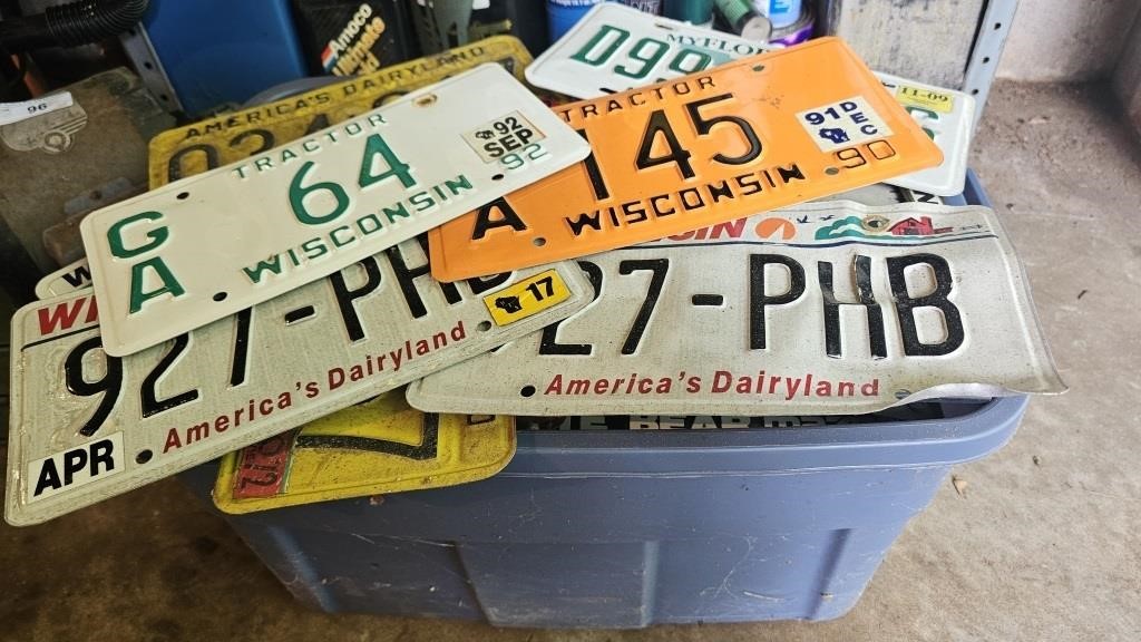 Large tote full of various license plates