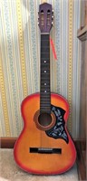 Vintage guitar with Humingbird pick guard