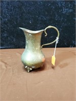 Brass pitcher with feet approx 8 inches tall