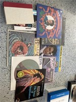 (7) Vinyl Records and (2) Books