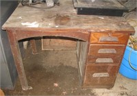 Wood four drawer desk. Measures 30" h x 42" w x