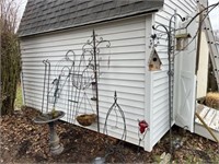 Garden decor on side of shed