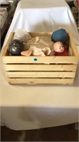 Dolls, wooden crate