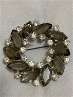 Vintage rhinestone brooch with white and smoky