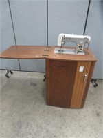 'BROTHER' TREADLE SEWING MACHINE IN CABINET