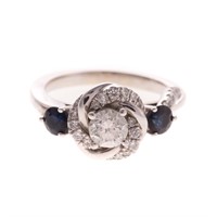 A Diamond & Sapphire Engagement Ring by Vera Wang
