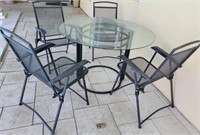 J - GLASS TOP TABLE W/ 4 CHAIRS (Y10)