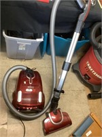Home Maid canister vacuum, works.