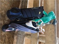 2 BAGS OF ASSORTED GOLF IRONS AND CLUBS