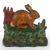 KLEISTONE RUBBER FIGURAL RABBIT BY FENCE
