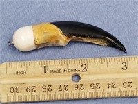 3" seal claw with ivory cap, made into a pendent