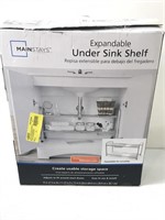 Expandable under sink shelf