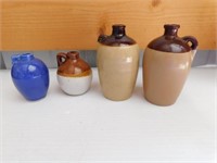 Four small jugs: blue USA - 2 brown & tan, one
