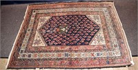 Vintage handwoven Oriental rug, 69"x52"; as is