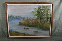 Framed oil on canvas, ducks in a landscape signed