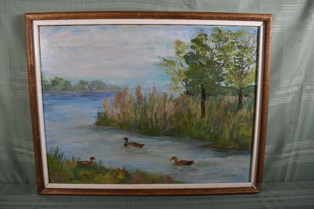 Framed oil on canvas, ducks in a landscape signed