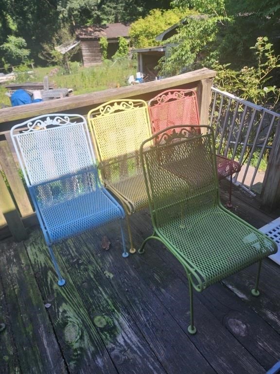 Four colorful metal chairs 18x34x25