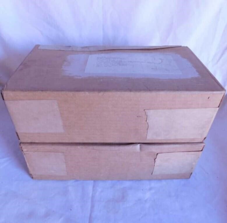 Two sealed boxes of 1957 military protective masks