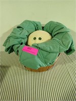 Cabbage patch kid and basket