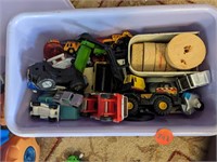 Plastic bin full of children's toys (Main room)