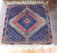 Small semi-antique wool pile prayer rug