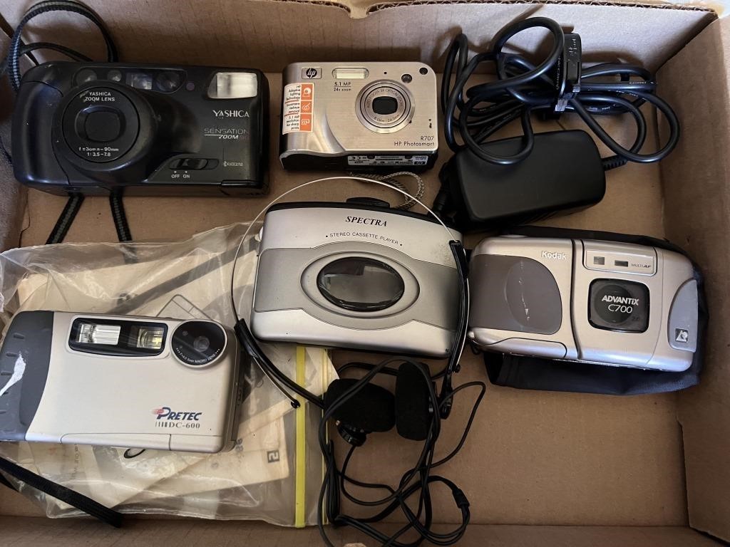 Lot of cameras and one Walkman