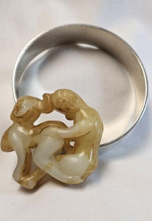 LADIES BANGLE & RESIN CARVING OF 2 FIGURES