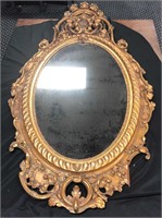 Gilt Carved Oval Mirror, 19th century.