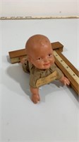 Celluloid crawling baby. Still crawls, given to