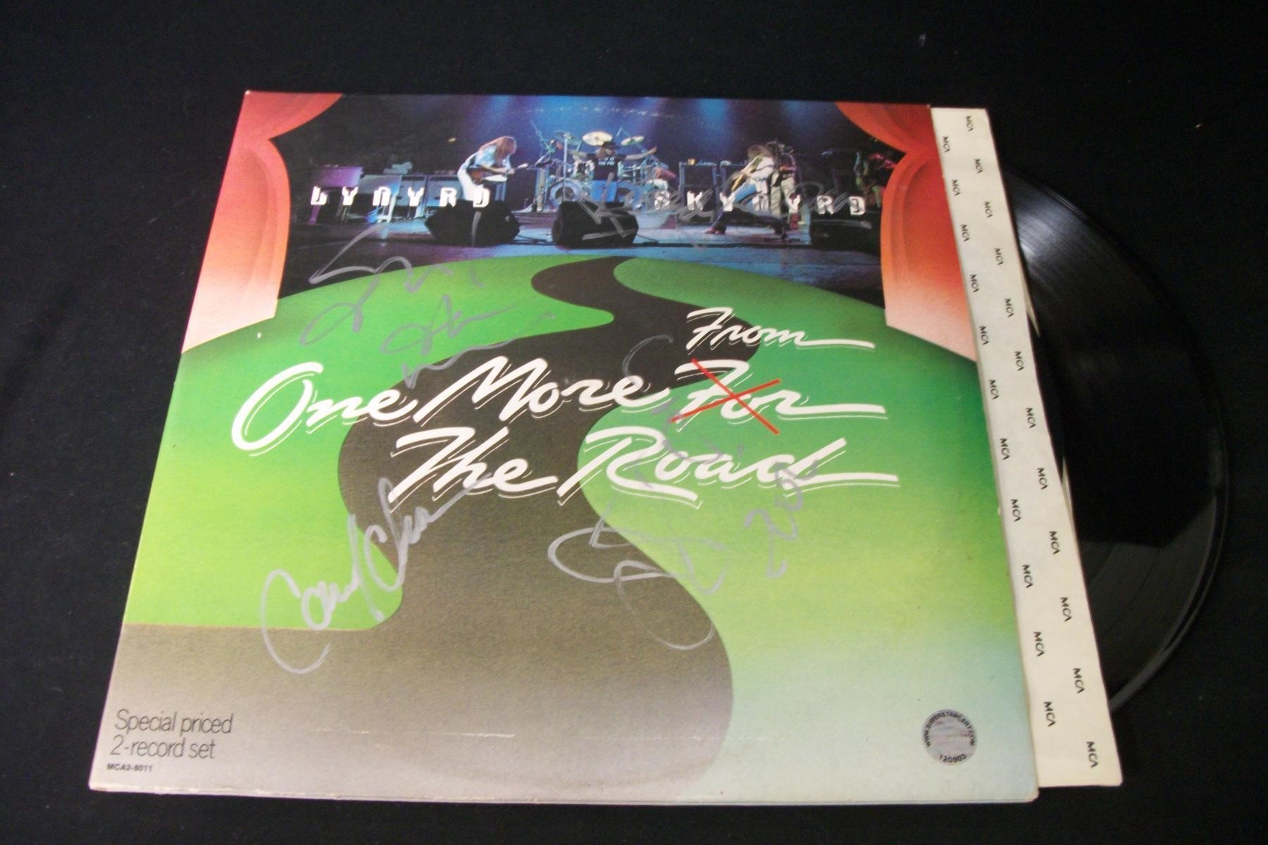 LYNYRD SKYNYRD BAND SIGNED ALBUM COVER COA