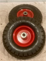 Set of unused tires and rims. 4.10 / 3.50 - 5