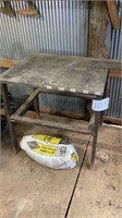 Metal frame table with wood top measures 29