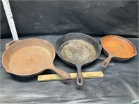 3 cast iron pans