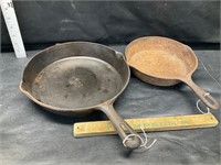 2 cast iron pans