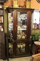 Beveled and carved glass curio cabinet