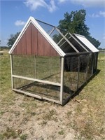 15’ x 6’ x 7’ tall wire cage on wheels.