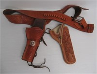 Leather holster and leather belt with holster.