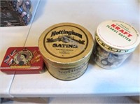 Old tins and jar full of buttons