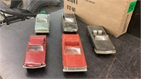 5 plastic model cars