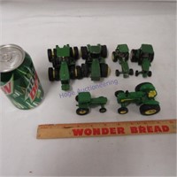 6 John Deere minature tractors