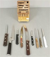 8 assorted maker knives in wood knife block