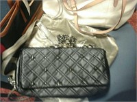 Black and cheetah inside Kate Landry purse