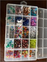 Box of beads for jewelry making.