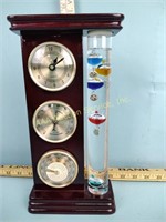 Galileo thermometer with barometers