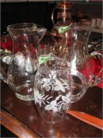 Etched glass pitchers