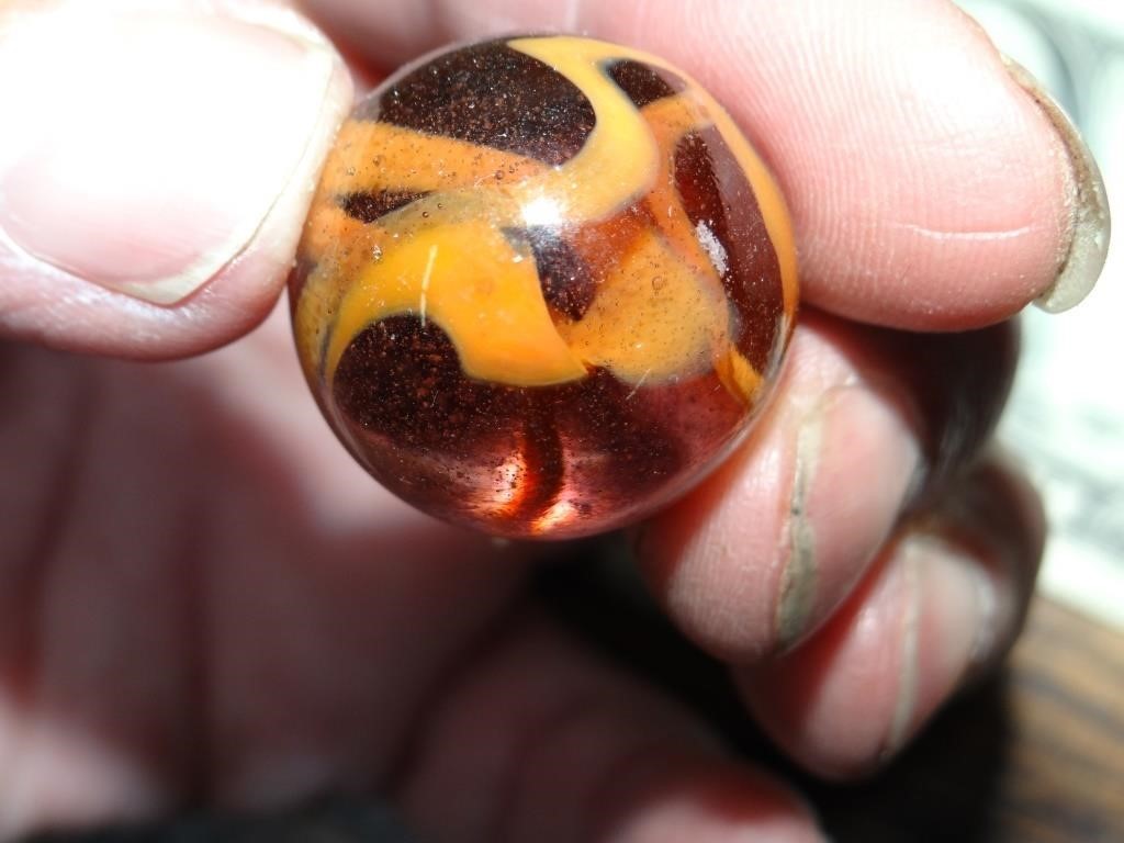 Orange/ Amber Shooter Marble w/ Swirls