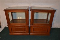 Two wood and glass front load table height display