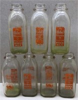 (7) Miller Dairy Bottles