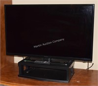 (L) 42" Insignia Flat Screen TV w/ Rotating Stand